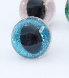 Glitter turvasilmas 12 mm, pakis 1 paar HELESINISED
