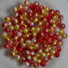 Akrüülpärlid 8 mm ca 190 tk  punase kuldse kirjud